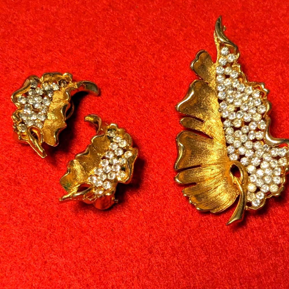 Vintage gold tone Brooch and Earrings with clear rhinestones signed BSK